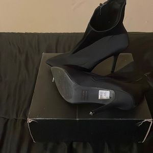 Solid black “Wild Diva” size 10 bootie. Never worn other than trying them on.